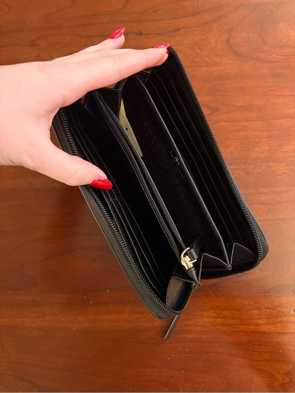 kate spade Black Striped Zip Wallet with Gold Logo